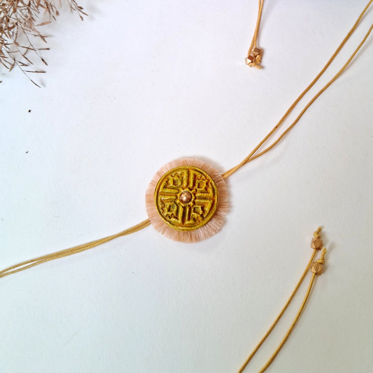 Hand-made Papier-mache Rakhi-Swastika-Yellow