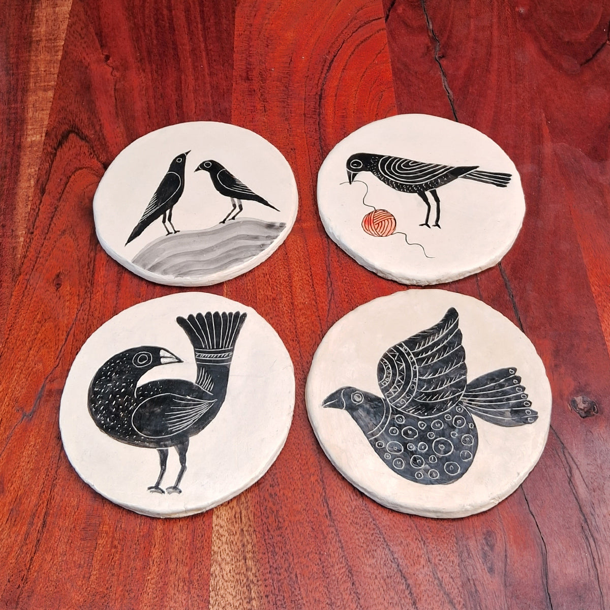 Hand-painted bird coasters