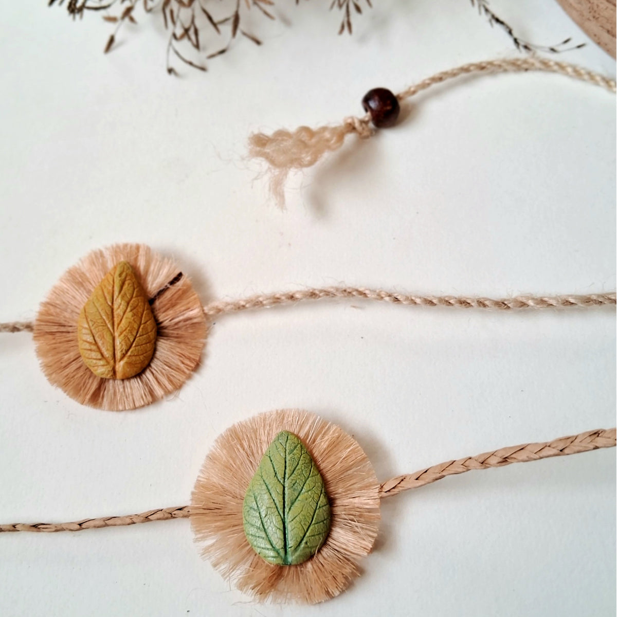 Handmade Papier-mache Twin Leaf Rakhi-Green & Yellow