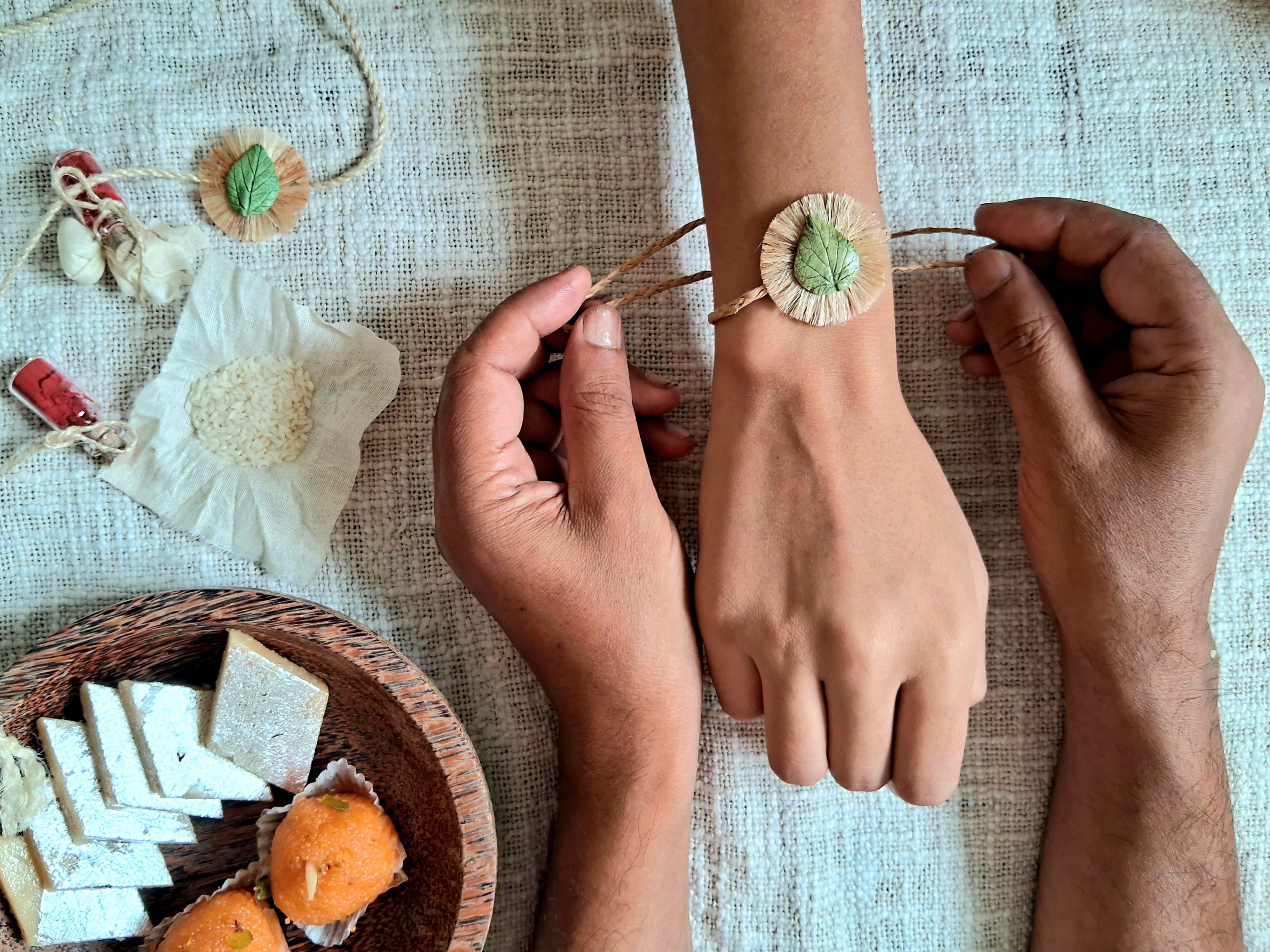 Handmade Papier-mache Twin Leaf Rakhi-Green & Yellow